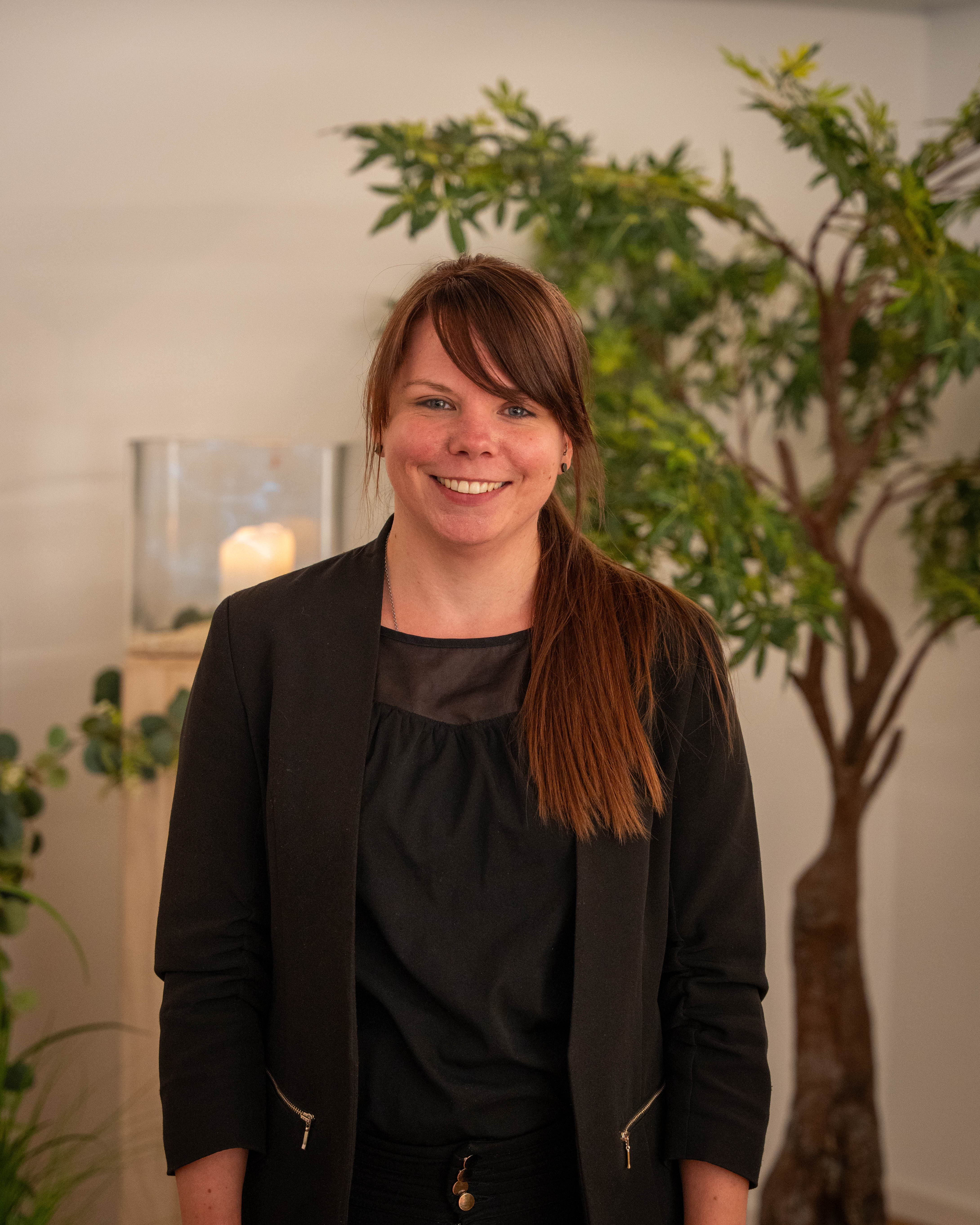 Portrait Mitarbeiter in Arbeitskleidung